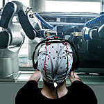 Human brain controlling computer robotics interface for human robotics cooperation