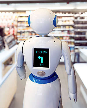 Rear view of humanoid robot with screen on torso displaying directions to ice cream.